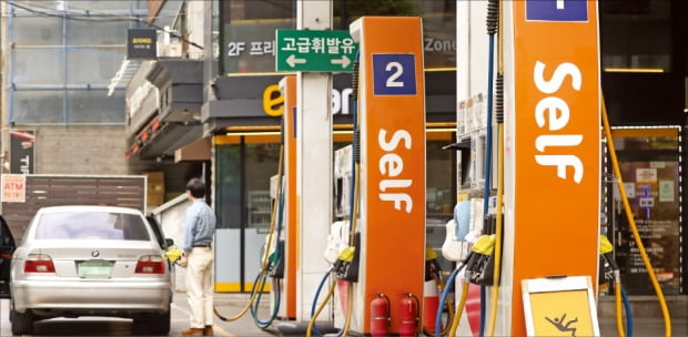휘발유 1L 넣으면 900원이 세금…유류세 내려 소비자가격 조절하죠